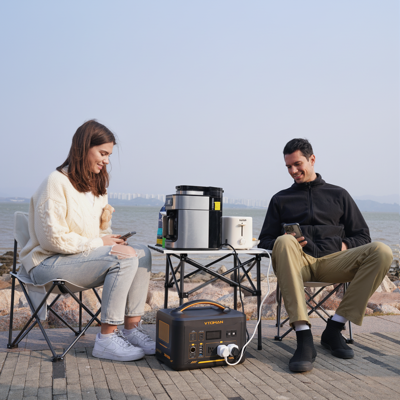 VTOMAN Jump 1800 power station, seaside camping scene powering kitchen appliances outdoors